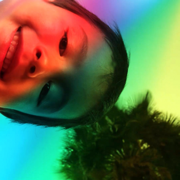Child with rainbow overlay