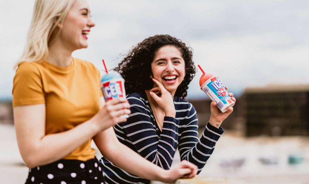 Two women drinking ICEEs